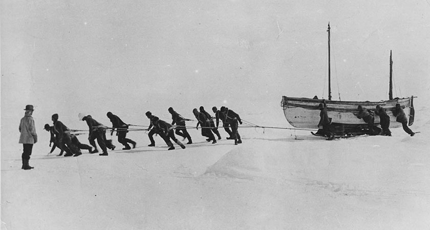 Photograph of Shackleton's expedition team pulling a lifeboat